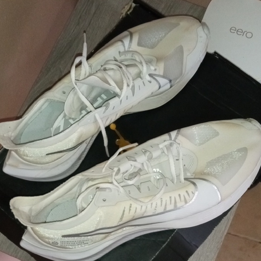 Nike White Athletic Shoes with Breathable Mesh and Chunky Midsole